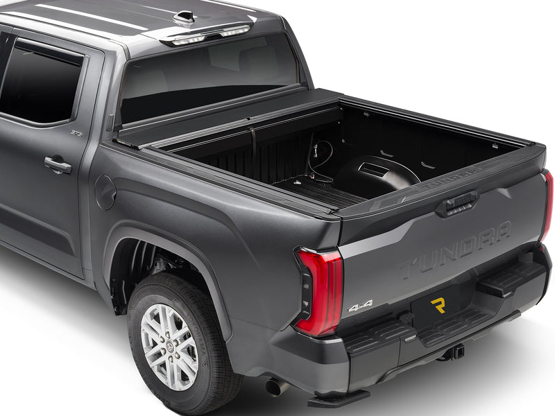 Roll-N-Lock A-Series XT fully retracted, rear three-quarter view of the open bed