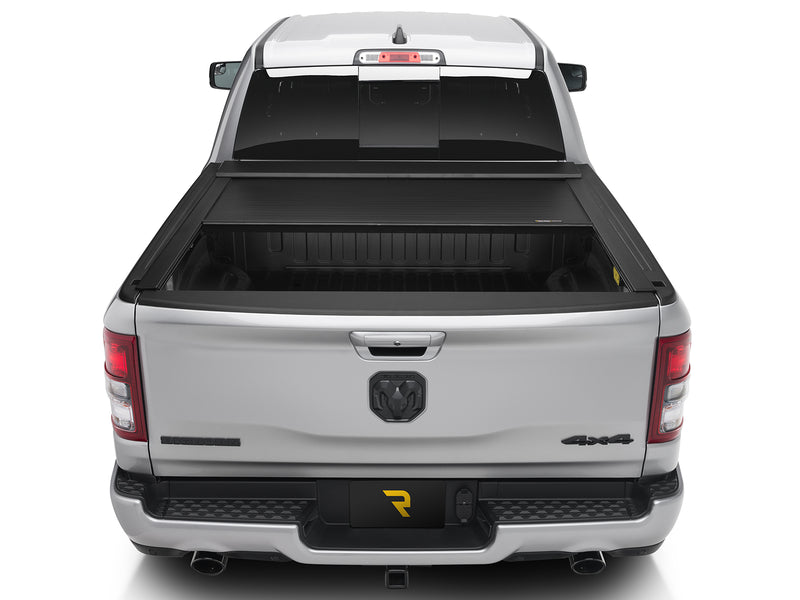 Roll-N-Lock E-Series retracted part way, straight rear view into the bed