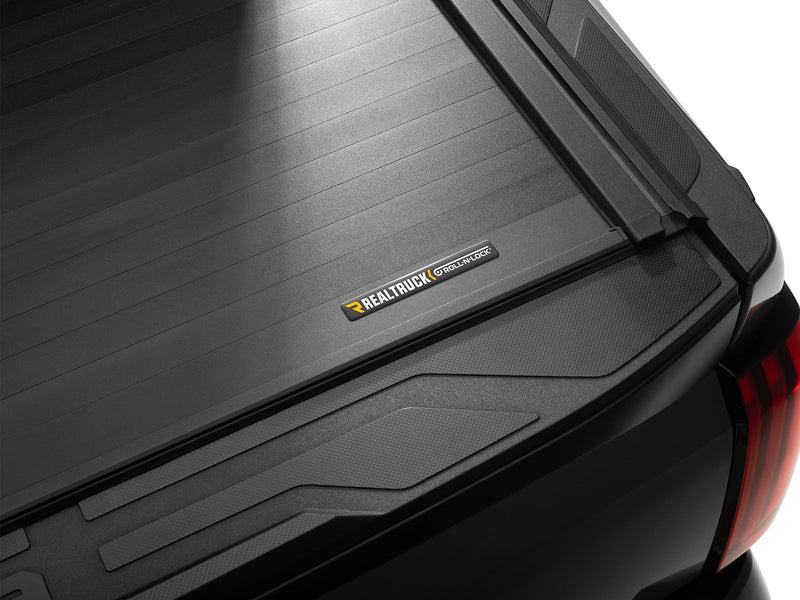 Roll-N-Lock E-Series XT closed cover corner and rail with the Roll-N-Lock name plate