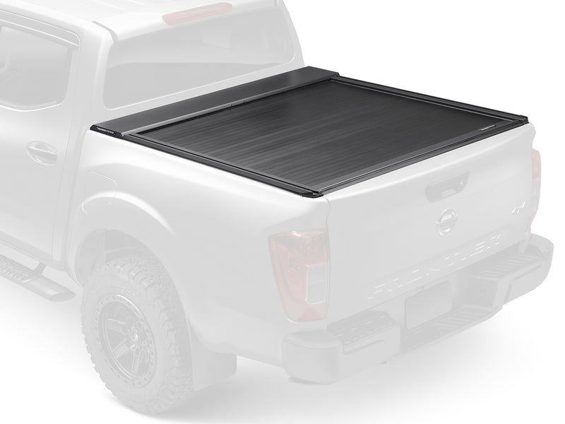 Roll-N-Lock E-Series XT shown fitted to a ghosted pickup, rear three-quarter view