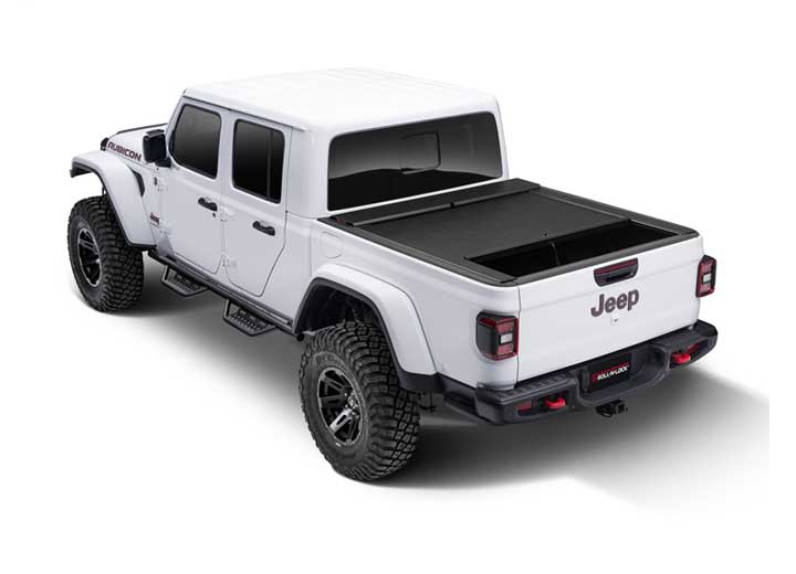 Roll-N-Lock M-Series fitted to a white 2020-2026 Jeep Gladiator Rubicon