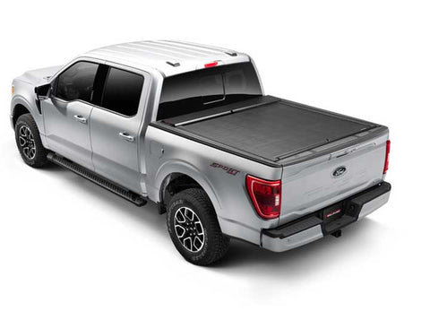 Roll-N-Lock M-Series retractable cover closed on a 2021 Ford F-150, rear three-quarter view