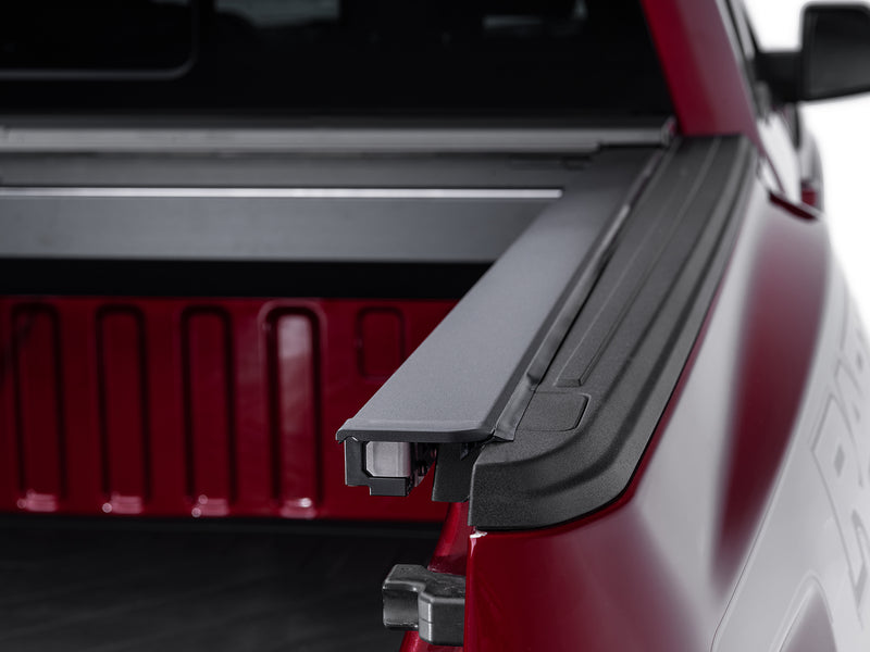 Roll-N-Lock M-Series canister and track from inside the bed