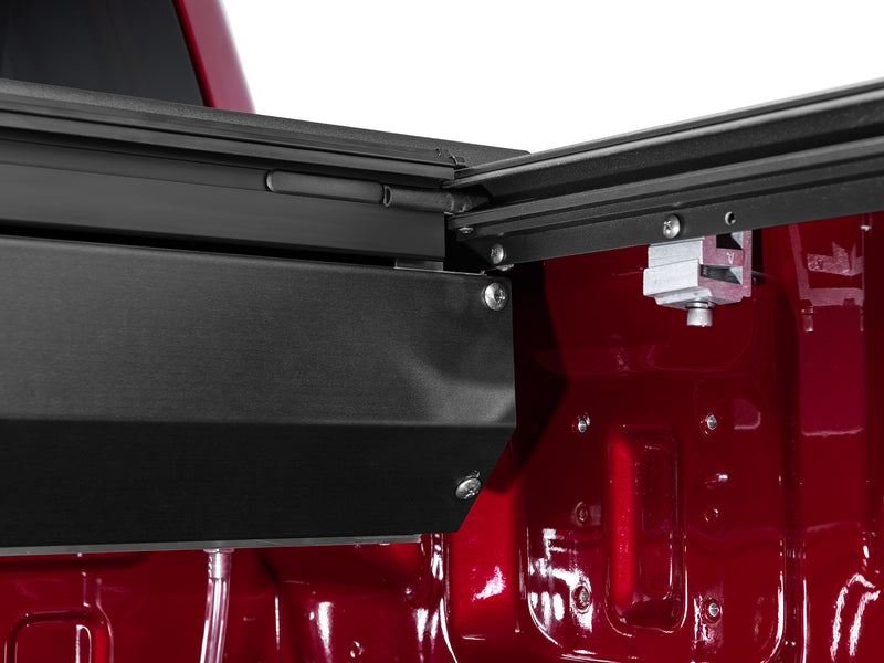 Roll-N-Lock M-Series canister housing seated against the bulkhead