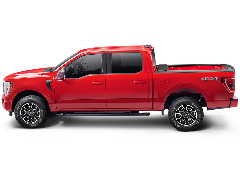 Roll-N-Lock M-Series XT fully retracted, full side profile of a 2021-2026 Ford F-150 with the bed open