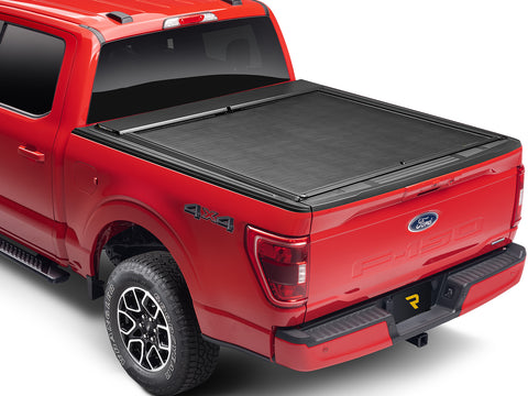 Roll-N-Lock M-Series XT closed over the bed, rear three-quarter view with the tailgate up