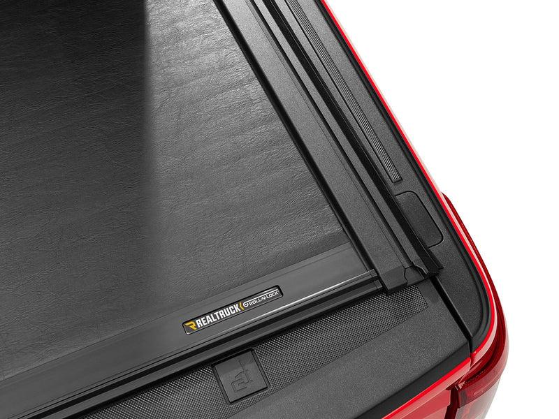 Roll-N-Lock M-Series XT cover corner and rail with the manufacturer badge