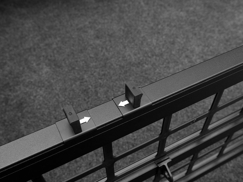 Roll-N-Lock Cargo Manager divider slider with its two white direction arrows