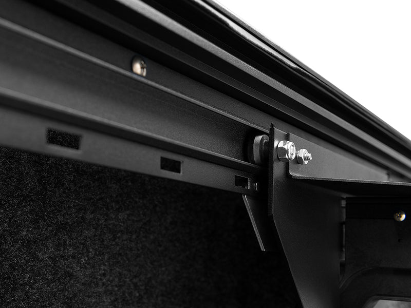 Roll-N-Lock Cargo Manager bed rail channel and the divider mounting hardware