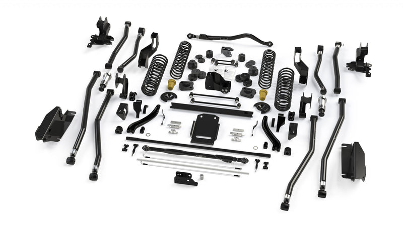 TeraFlex Alpine Long Arm Suspension, shown on a studio background: exploded TeraFlex long-arm lift kit with long arms, black crossmember, skid plate and coil springs on white