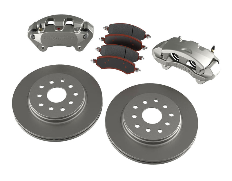 TeraFlex front big brake kit with two calipers, brake pads and two vented rotors on a white background