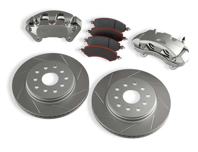 TeraFlex front big brake kit with two calipers, brake pads and two slotted rotors on a white background