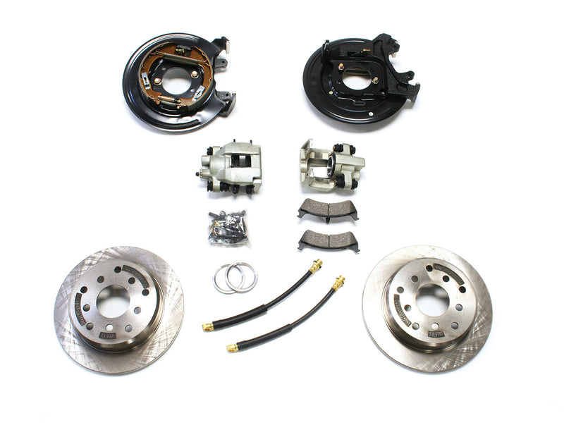 TeraFlex rear disc brake conversion kit with backing plates, calipers, rotors, pads, hoses and hardware on a white background