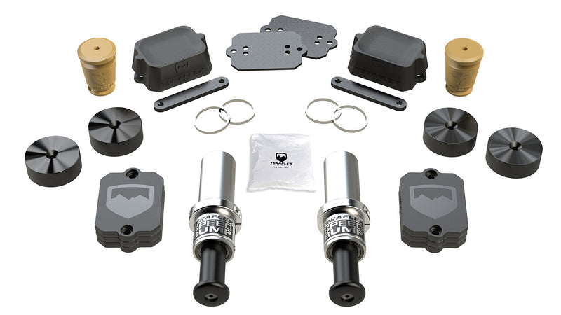 TeraFlex Bump Stop Kit, shown on a studio background: TeraFlex Speed Bump bump stop kit with hydraulic bumps, four machined cups, spacers and hardware on white