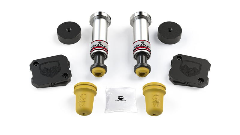 TeraFlex Bump Stop Kit, shown on a studio background: TeraFlex SpeedBump bump stops, yellow Falcon bump stops, spacers and pads on white