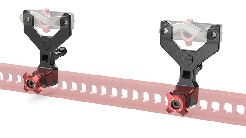 Close-up of the TeraFlex Cargo Rack & Rail Accessory: rendered two black Y-brackets with red knobs clamped to a translucent red slotted rail