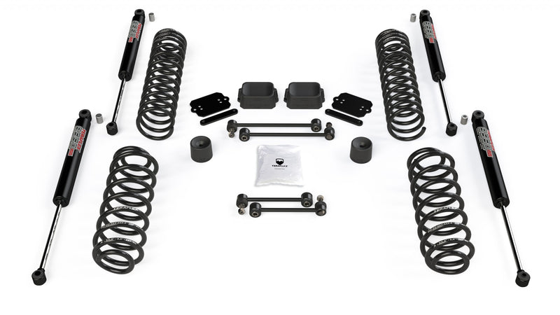 TeraFlex Coil Spring Lift Kit, shown on a studio background: four TeraFlex coil springs and four 9550 shocks with spacers and sway links on white