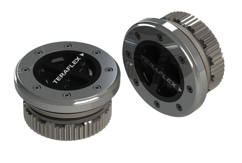 TeraFlex Driveline Component, shown on a studio background: pair of TeraFlex locking hubs with TeraFlex dials on white