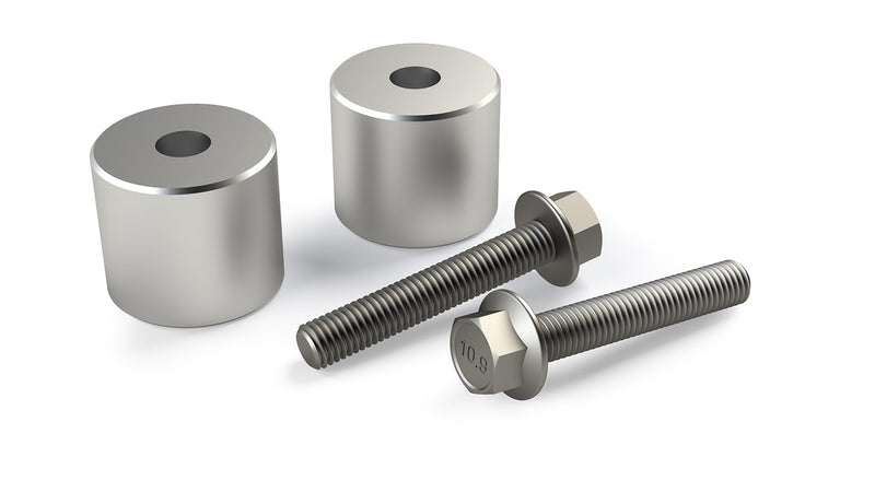 TeraFlex Driveline Component, shown on a studio background: rendered pair of silver cylindrical spacers with two 10.9 flange bolts on white