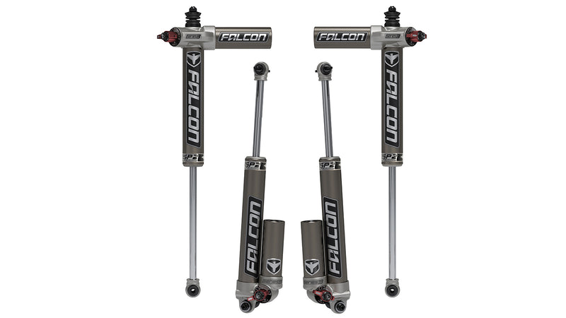 Set of four TeraFlex Falcon SP2 3.3 Fast Adjust piggyback shocks on a white background