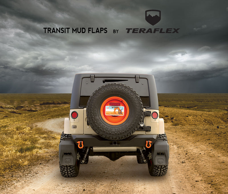 Rear of a Jeep Wrangler fitted with TeraFlex Transit Mud Flaps, with the product name above