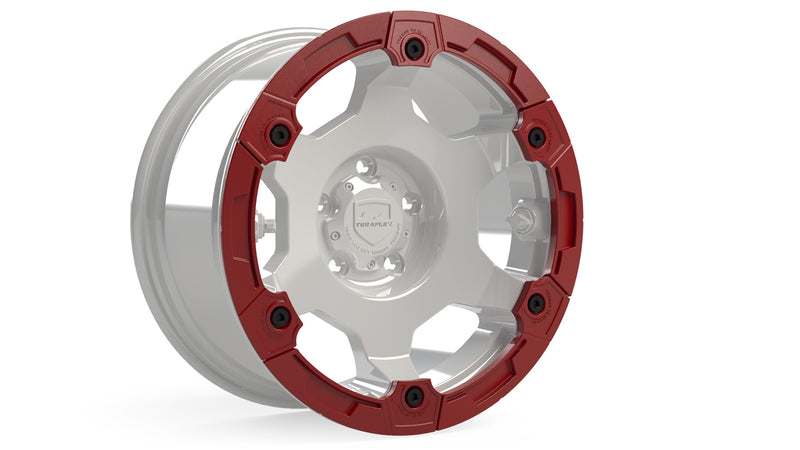 TeraFlex modular rash ring in red fitted to a wheel shown in gray