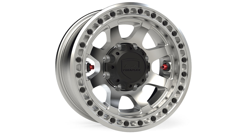 TeraFlex Off-Road Wheel, shown on a studio background: machined silver 8-lug beadlock-style wheel with black TeraFlex center cap and red valve stems on white