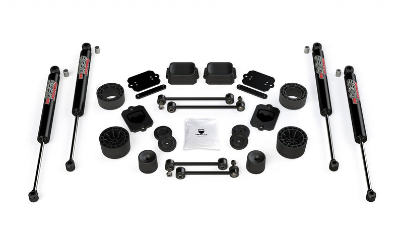 TeraFlex Performance Spacer Lift Kit, shown on a studio background: TeraFlex spacer lift kit with four black 9550 shocks, coil spacers, sway links and plates on white
