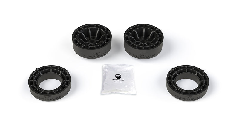 TeraFlex Performance Spacer Lift Kit, shown on a studio background: two 1.5" and two 1" black coil spring spacers with hardware pack on white