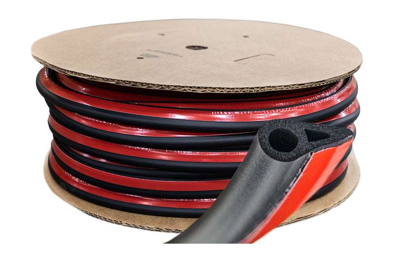 ACCESS TrailSeal tailgate seal: black foam gasket with red peel-and-stick backing, shown on the bulk roll with the cut end facing