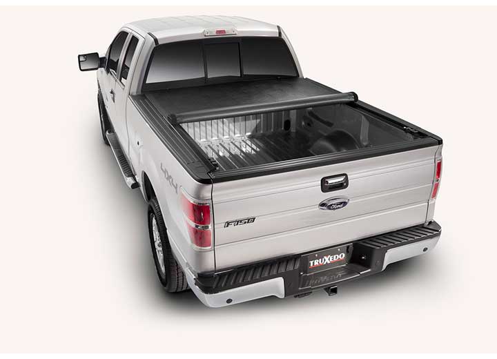 TruXedo Deuce soft folding tonneau cover folded partway open on a 2009-2014 Ford F-150, rear three-quarter view