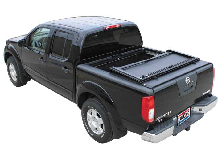 TruXedo Deuce soft folding tonneau cover folded flat at the bulkhead over the bed of a pickup truck