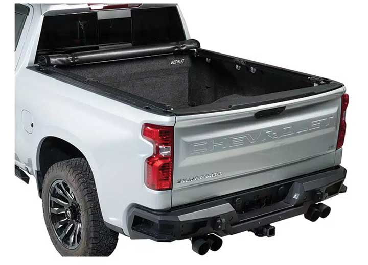 TruXedo Deuce soft folding tonneau cover folded flat at the bulkhead over the bed of a pickup truck