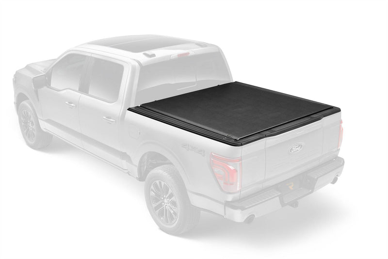 Lo Pro tonneau cover closed over the bed, shown on a faded pickup so the cover stands out