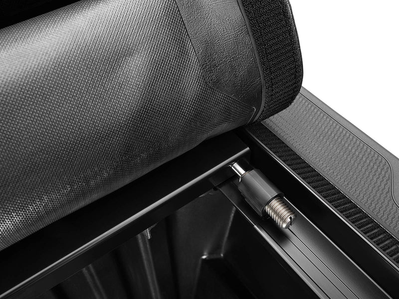 Rolled Lo Pro cover above the side rail, showing the spring-loaded tension adjuster on the rear rail