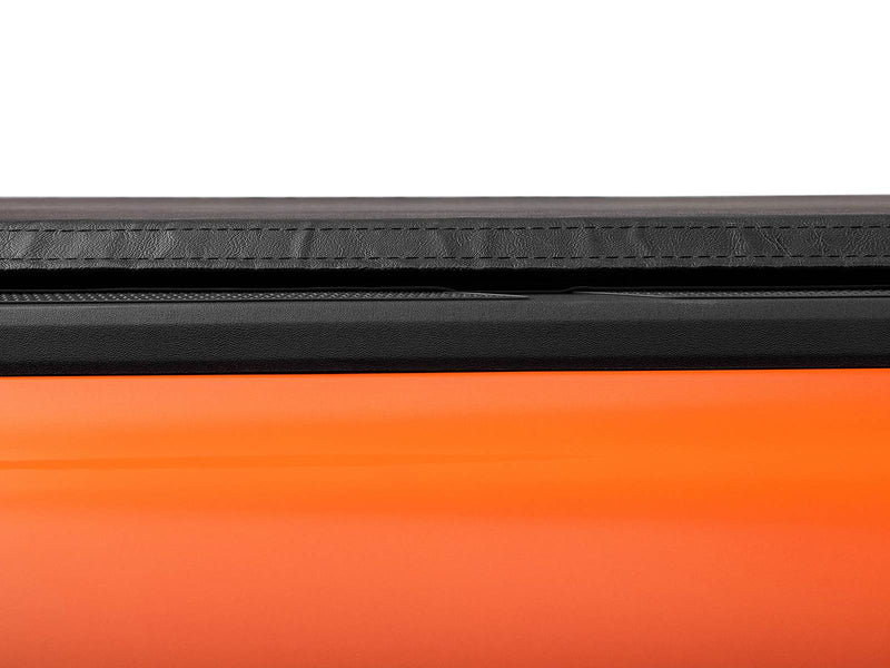 Side profile of the closed Lo Pro cover sitting low on the bed rail