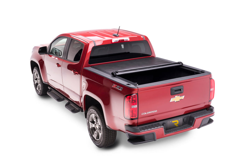 TruXedo Lo Pro soft roll-up tonneau cover rolled partway open on a 2015-2022 Chevrolet Colorado