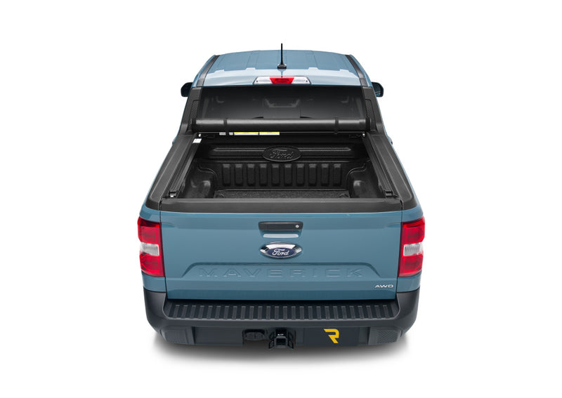 TruXedo Lo Pro soft roll-up tonneau cover rolled forward to the cab on a 2022-2024 Ford Maverick, straight rear view