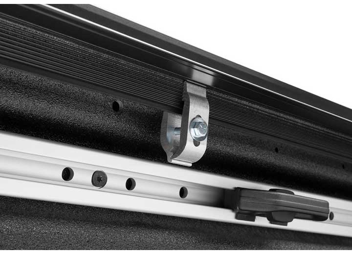 Close-up of the clamp hardware on a TruXedo Lo Pro soft roll-up tonneau cover