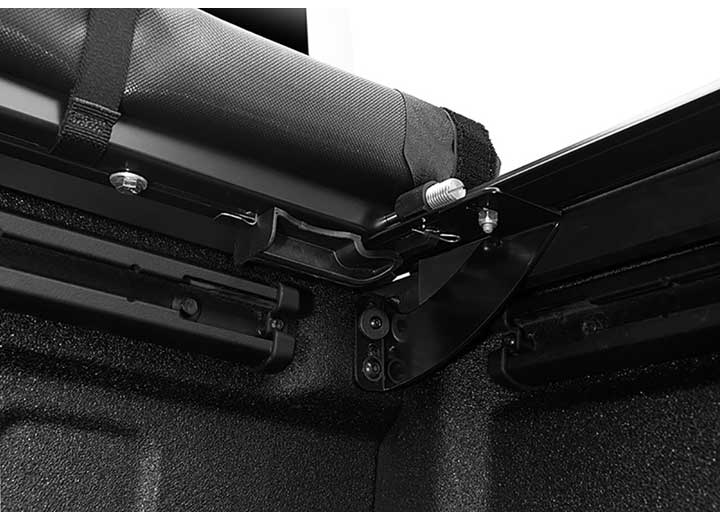 Close-up of the header rail at the tailgate on a TruXedo Lo Pro soft roll-up tonneau cover