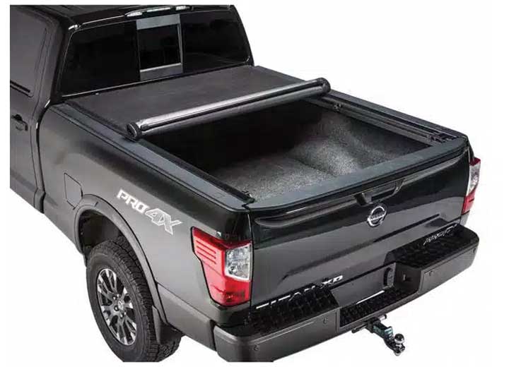 TruXedo Lo Pro soft roll-up tonneau cover rolled forward to the cab over the bed of a pickup truck, rear three-quarter view