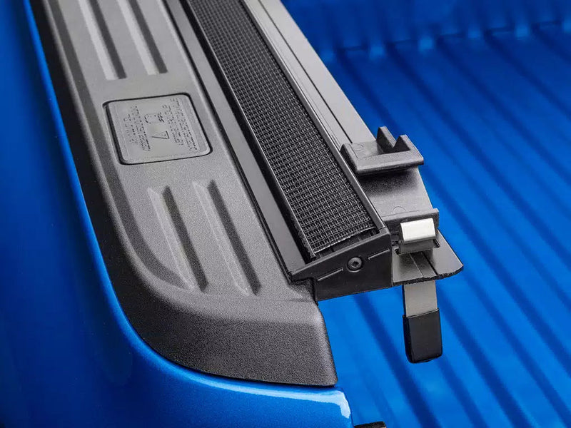 Close-up of the low-profile side rail and the tailgate-end latch