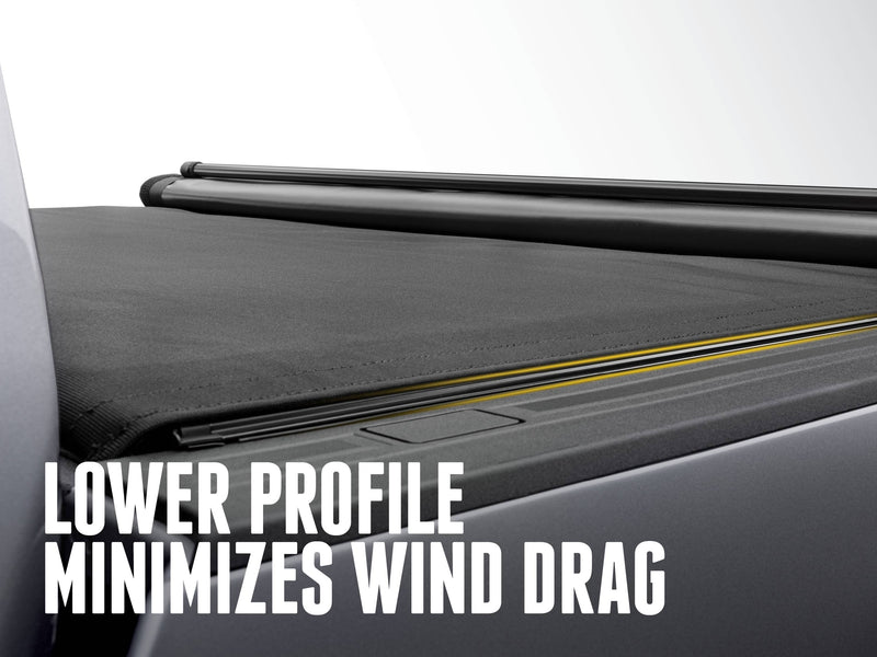Low-profile cover edge sitting flush along the side rail, text reads Lower profile minimizes wind drag