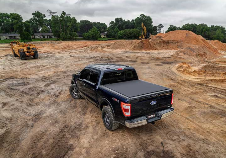 TruXedo Pro X15 soft roll-up tonneau cover closed on a pickup bed at a construction site