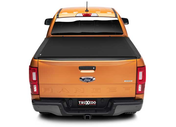 TruXedo Pro X15 soft roll-up tonneau cover closed over the bed of a pickup truck, straight rear view