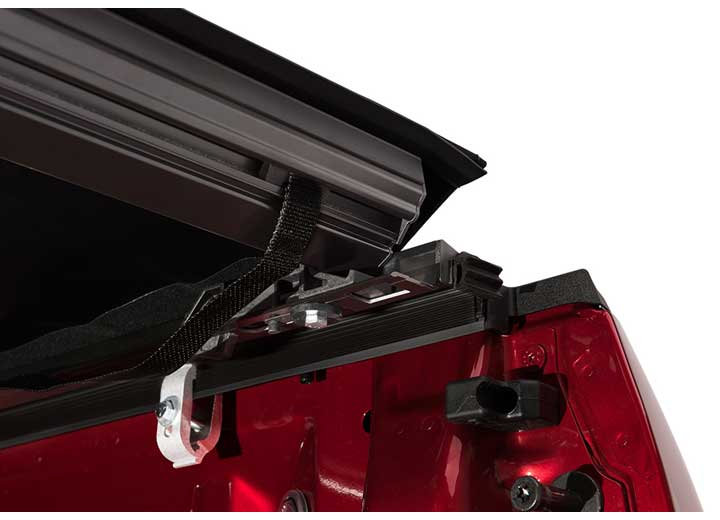 Close-up of the latch and tensioning mechanism on a TruXedo Pro X15 soft roll-up tonneau cover