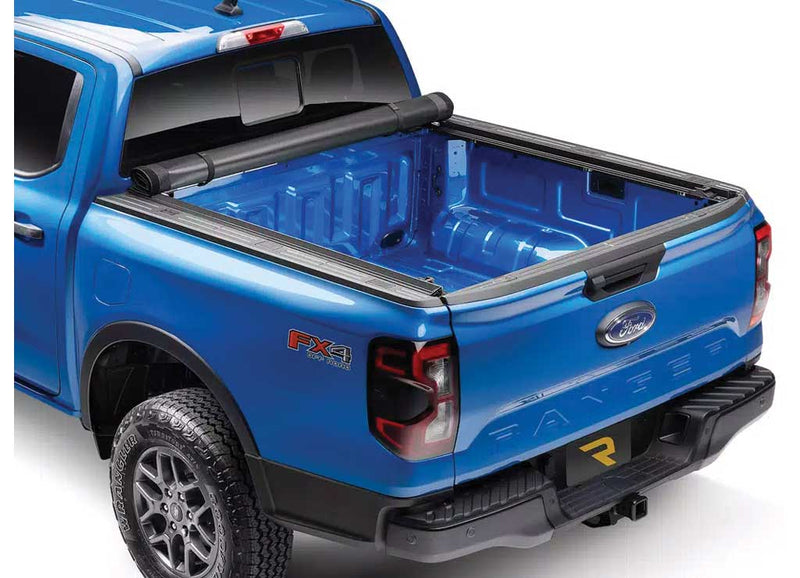 TruXedo Pro X15 soft roll-up tonneau cover rolled forward to the cab over the bed of a pickup truck