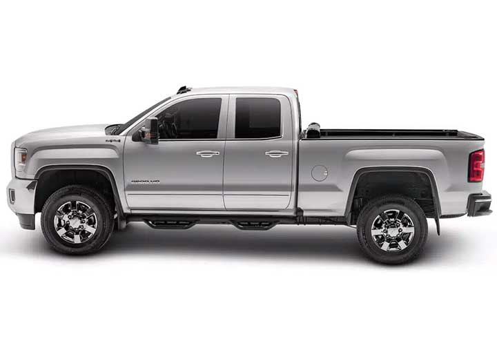 TruXedo Pro X15 soft roll-up tonneau cover rolled forward to the cab over the bed of a pickup truck