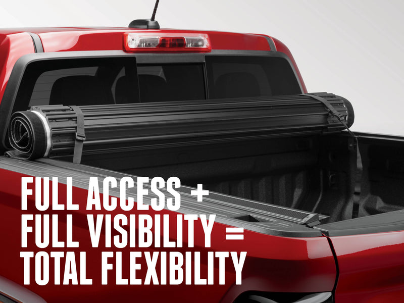 Sentry cover rolled toward the cab over a red pickup bed, with the text Full access plus full visibility equals total flexibility