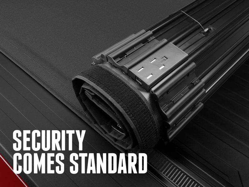 The rolled Sentry CT showing its interlocking aluminum slats and tension cable, with the text Security comes standard